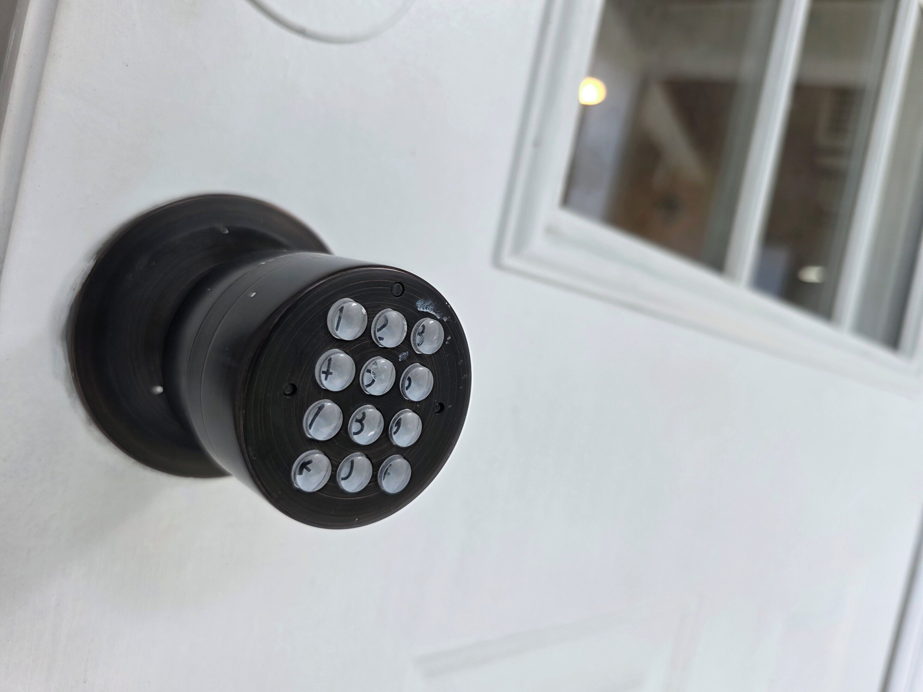 A door with a keypad lock.