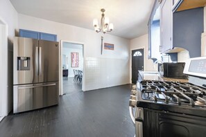 Microwave, oven, coffee/tea maker, cookware/dishes/utensils