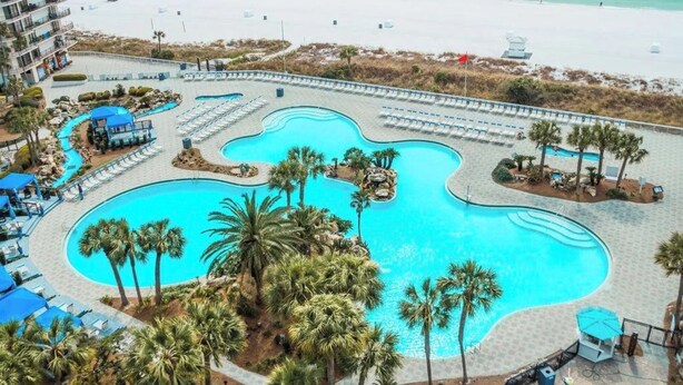 A resort with a large central pool, multiple smaller pools, and a beach area. - Sea Spray Studio - updated, affordable way to enjoy the best of Edgewater (Panama City Beach)