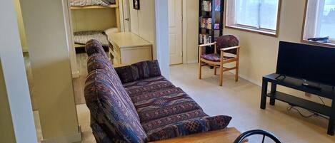 Chambre double, salle de bain privĂ©e, vue sur lâocĂ©an (Family Suite) | Bar-salon