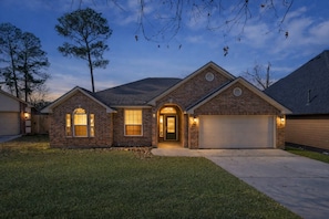 Exterior - NEW! Single Story 3BR Lake Retreat | Covered Patio, Fenced Yard, Sleeps 6, Great Location (Montgomery)