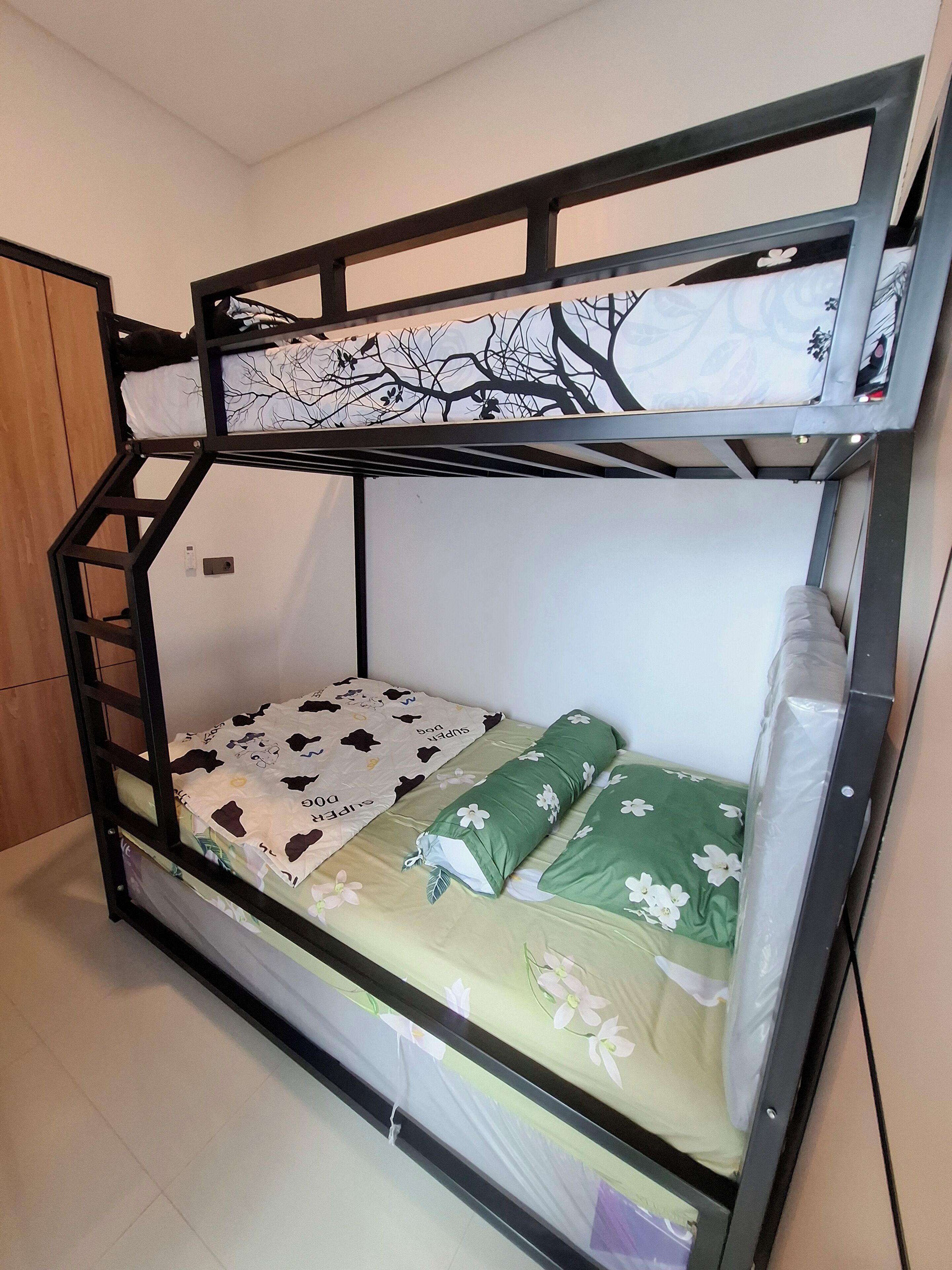 A bunk bed with a lower bunk and a top bunk.