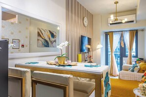 Signature Condo, 1 Bedroom, Balcony, Pool View | In-room dining - 1BR Near MOA Balcony & Wi-Fi (Pasay)