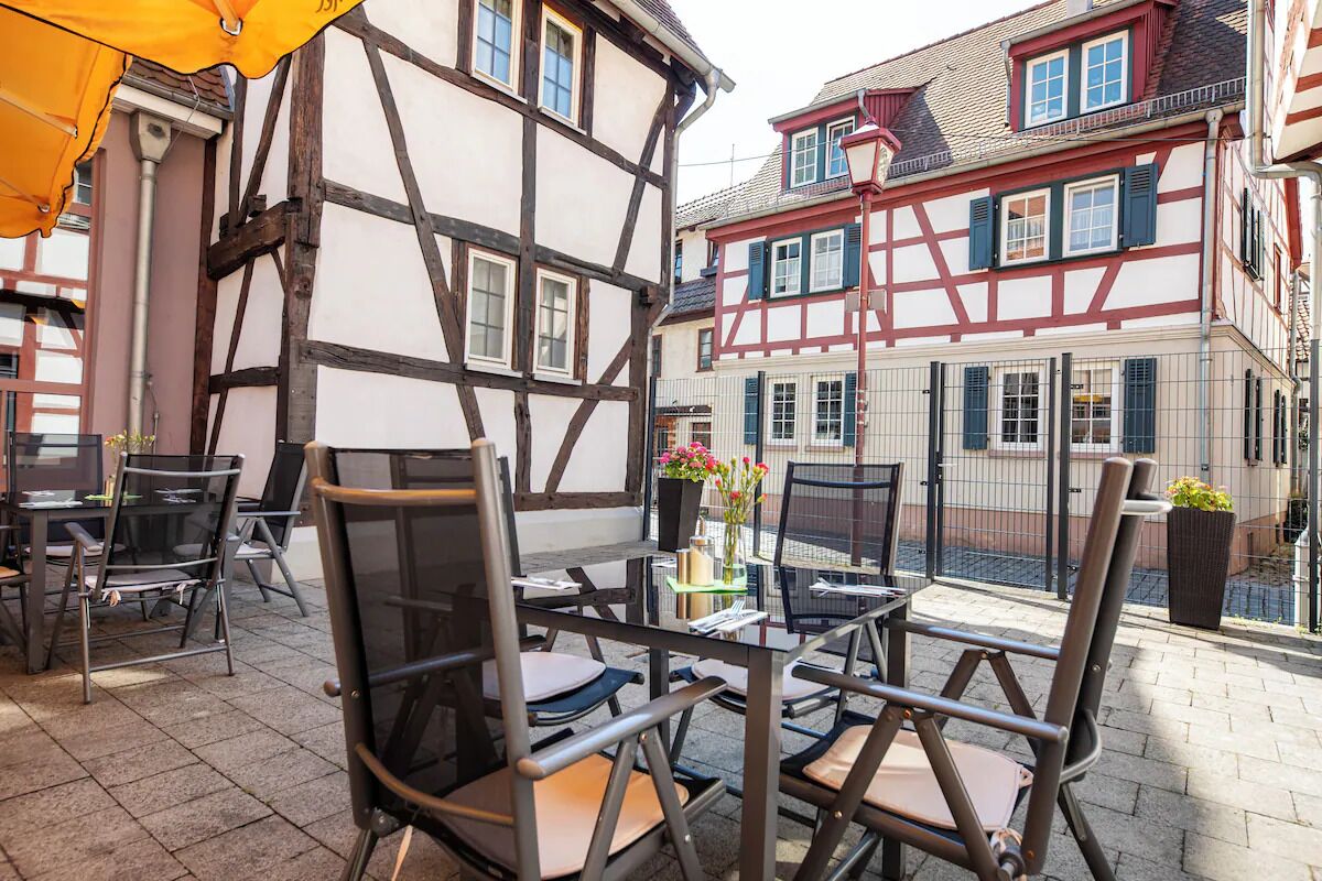 Sip coffee outdoors in the charming courtyard seating area.