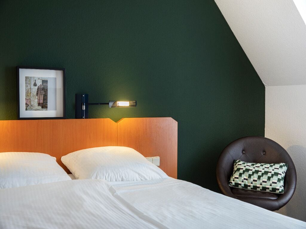 Curl up beside the accent wall and enjoy a peaceful night.