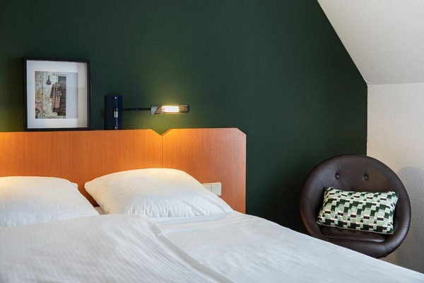 Curl up beside the accent wall and enjoy a peaceful night.