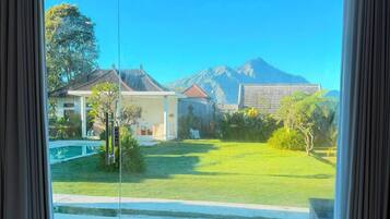 Suite, Pool View | Desk, free WiFi, bed sheets