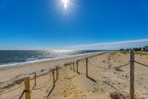 A beach with a wooden fence and a clear sky. - Walk to Broadkill Beach: Sleek Family Home w/ Deck (Milton)