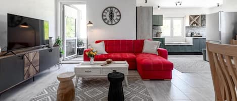 House (Three bedroom Villa) | Living room | 32-inch Smart TV with digital channels