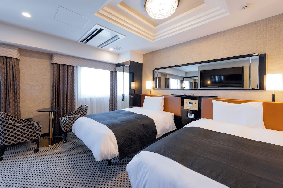 Chambre Deluxe avec lits jumeaux, non-fumeurs | Couette en duvet d'oie, rideaux occultants, Wi-Fi gratuit, draps fournis