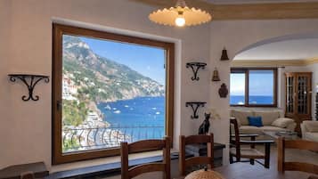 Villa, Sea View | Living area | 32-inch flat-screen TV with satellite channels