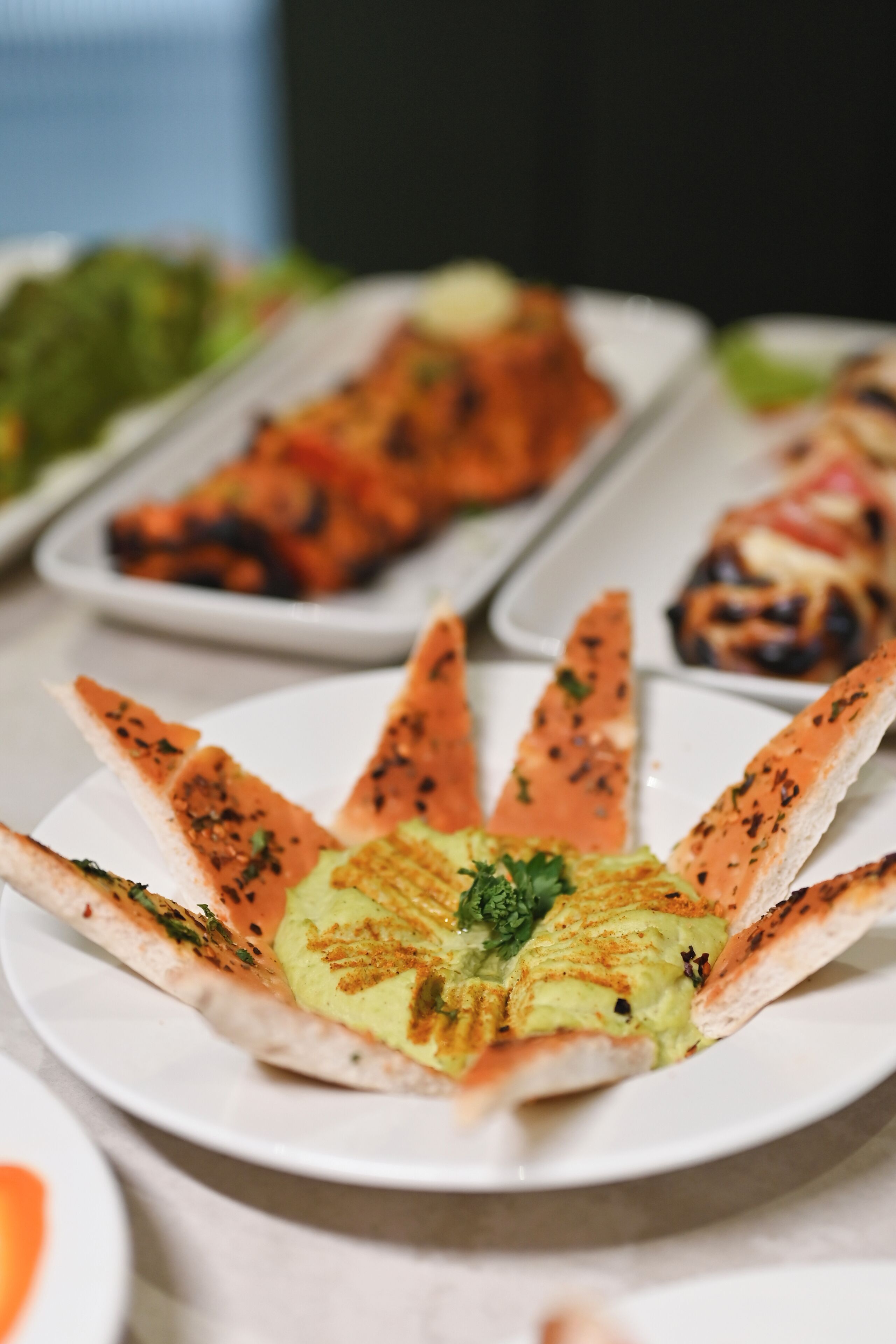 A variety of dishes on a buffet table.