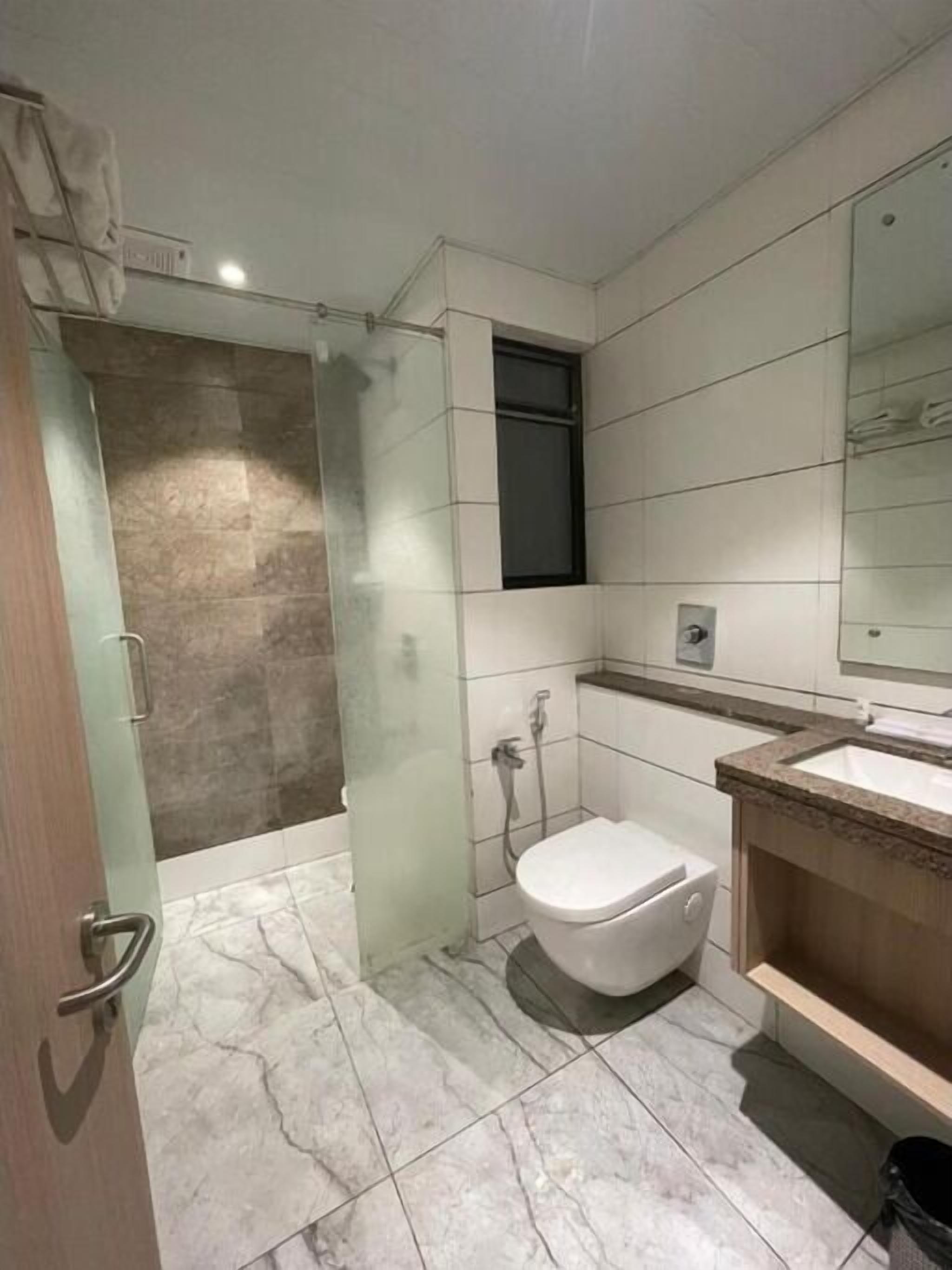 Shower, towels, soap, shampoo