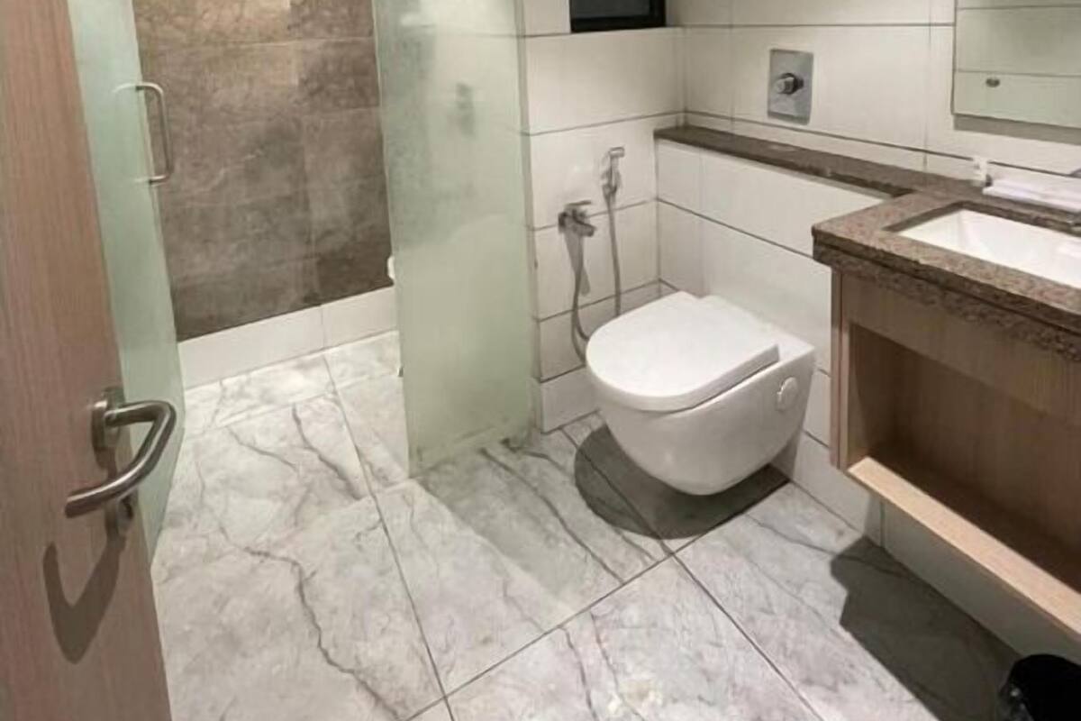 Shower, towels, soap, shampoo