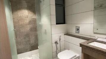 Shower, towels, soap, shampoo