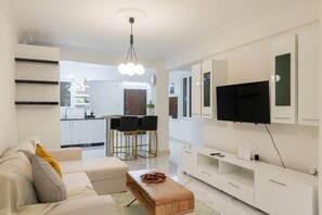 TV - A Haven in Kypseli  A Basement Apartment (Athina)