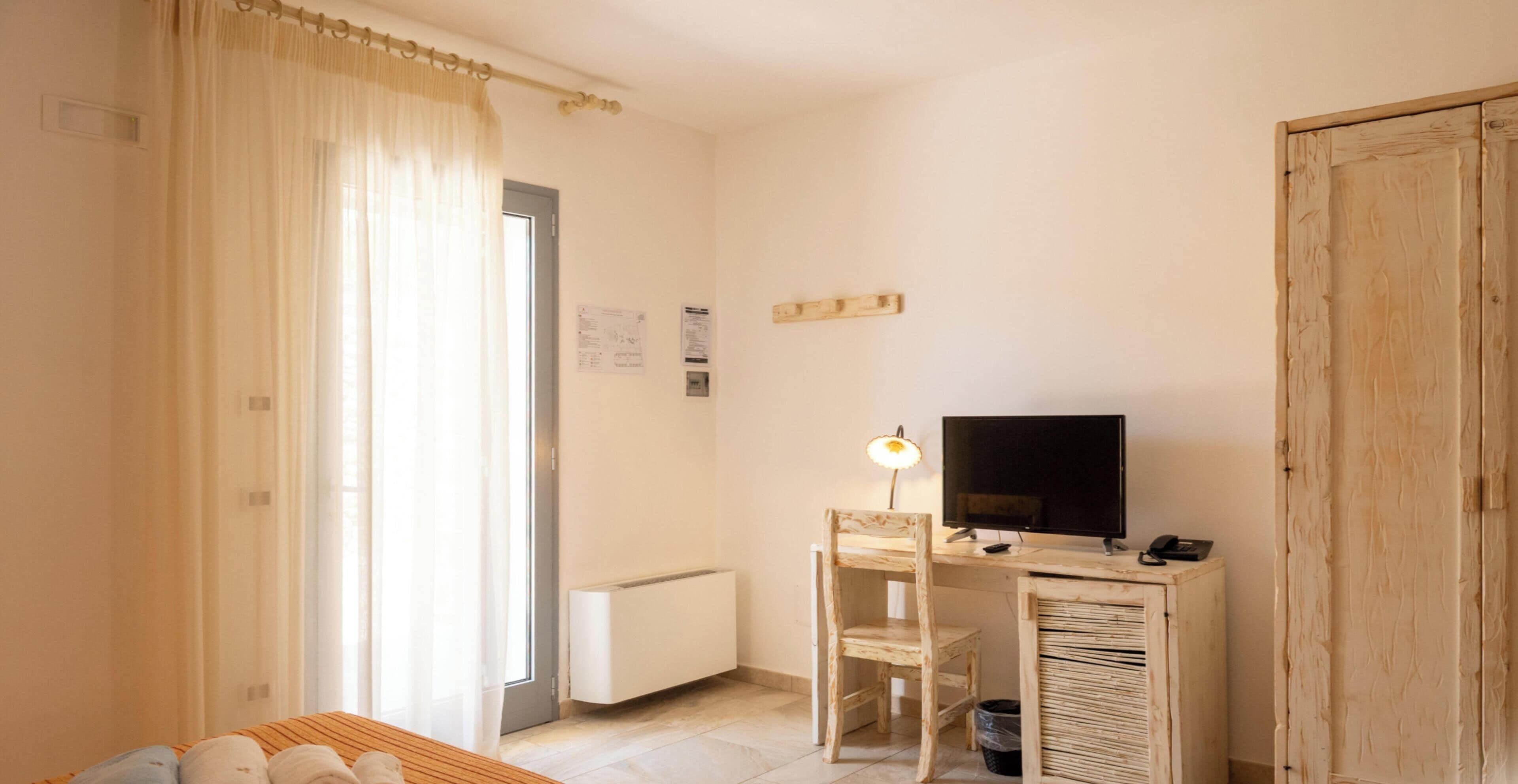 Camera Standard con letto matrimoniale o 2 letti singoli | Minibar, una cassaforte in camera, Wi-Fi gratuito, lenzuola