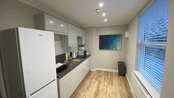 Coffee/tea maker, fridge, microwave, toaster