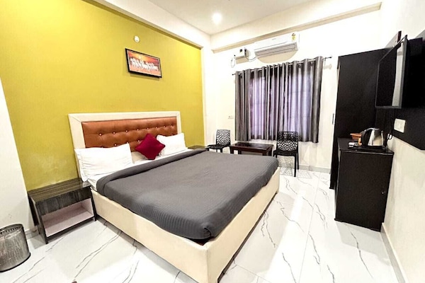Deluxe Double Room, Balcony, City View | Desk, laptop workspace, free WiFi
