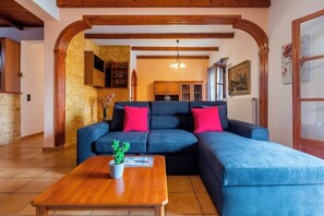 TV, fireplace - Casa Corfina - a charming 92 m² first-floor village house (HR9V+RVW Sinarades, Greece)