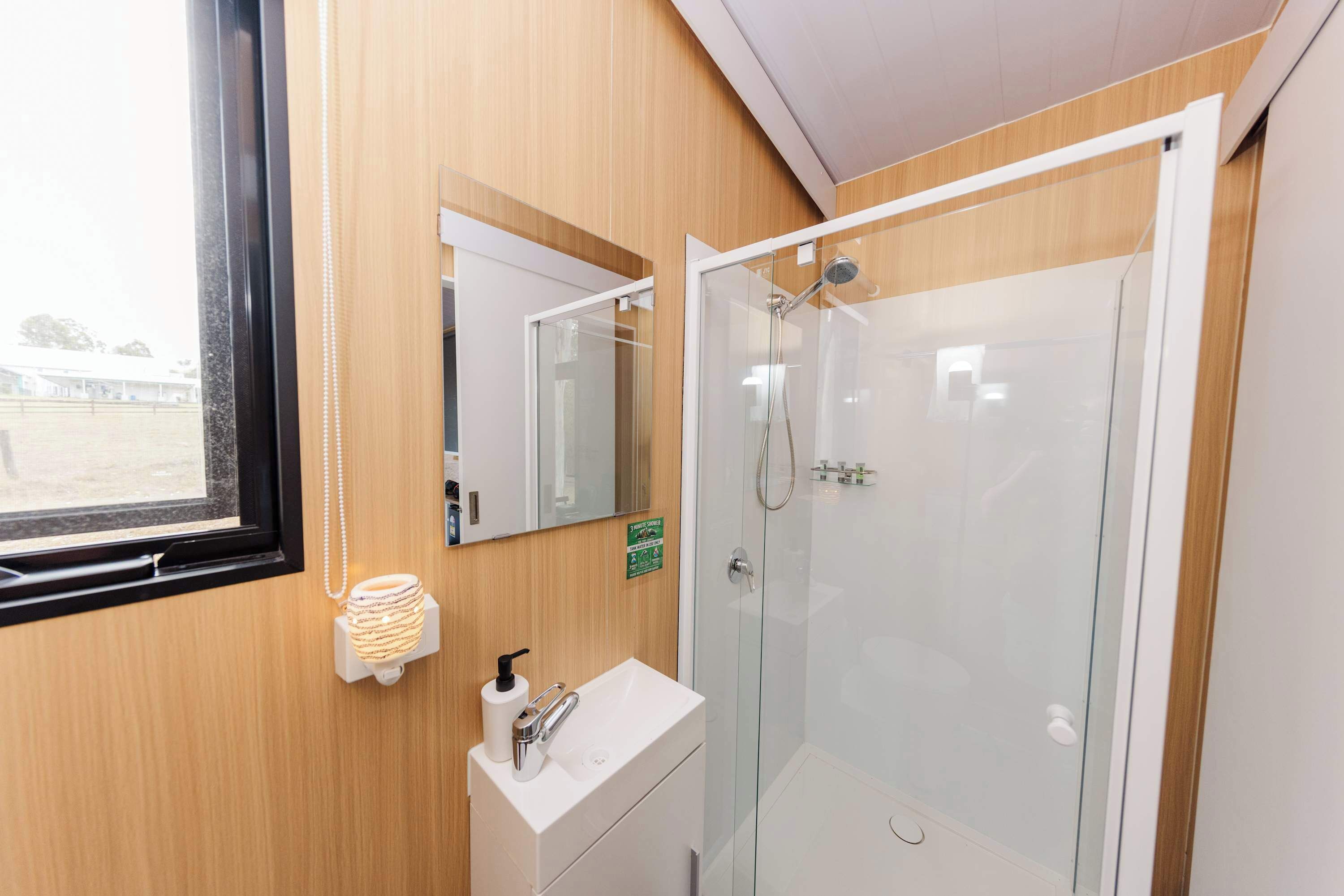 Shower, hair dryer, towels, shampoo