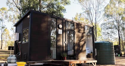 Kenny and Clancy's Camp by Tiny Away