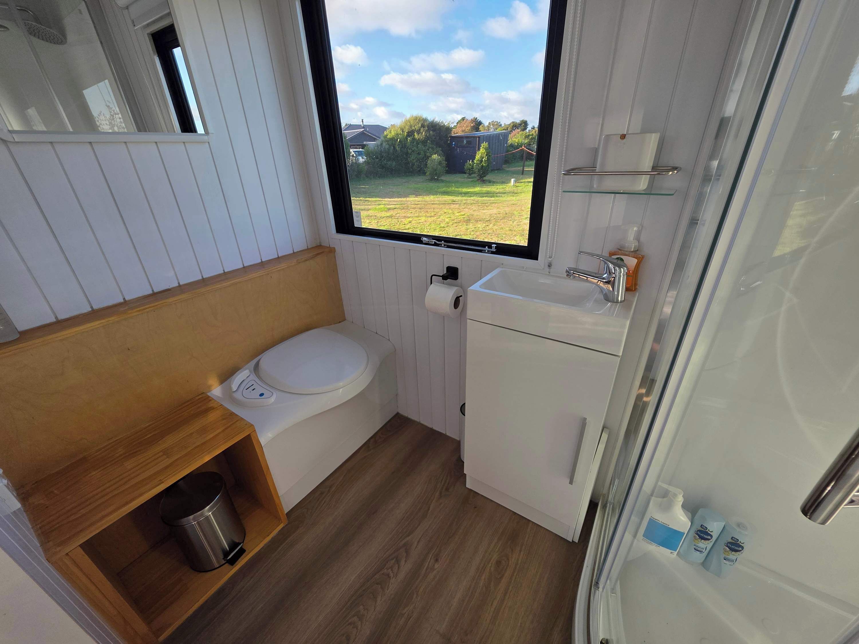 Shower, hair dryer, towels, shampoo