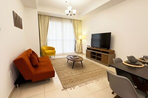 TV - Stylish 1BR Canal View Apartment | Business Bay (Dubai)