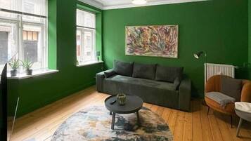 Căn hộ tiện nghi đơn giản, quang cảnh vườn | Khu phòng khách