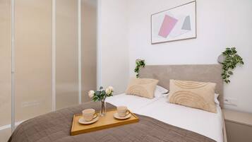 1 slaapkamer, een strijkplank/strijkijzer, reisbedje, wifi