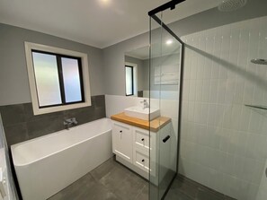 Shower, hair dryer, towels, soap