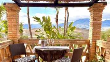 Suite Superior, vista giardino | Ristorazione all'aperto