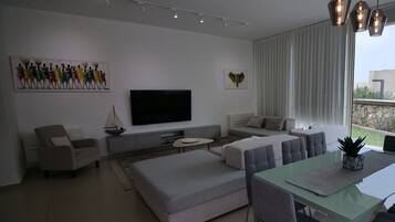 Premier Villa, Sea View | Living area | 50-inch Smart TV with digital channels, Netflix, streaming services