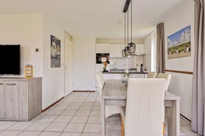 Dining - Stay at Holiday Home Schoneveld 249 at Holiday Park Schoneveld. This dog-friendly property has an enclosed garden and a bedroom downstairs. (Breskens)
