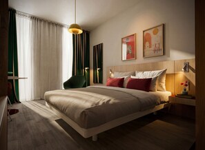 Un dormitorio moderno con una cama grande, una silla verde, una mesita de noche con lámpara y una obra de arte en la pared.