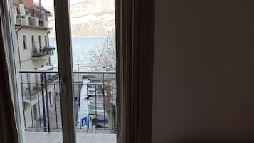 Apartment, Balcony, Lake View | Living area | Flat-screen TV