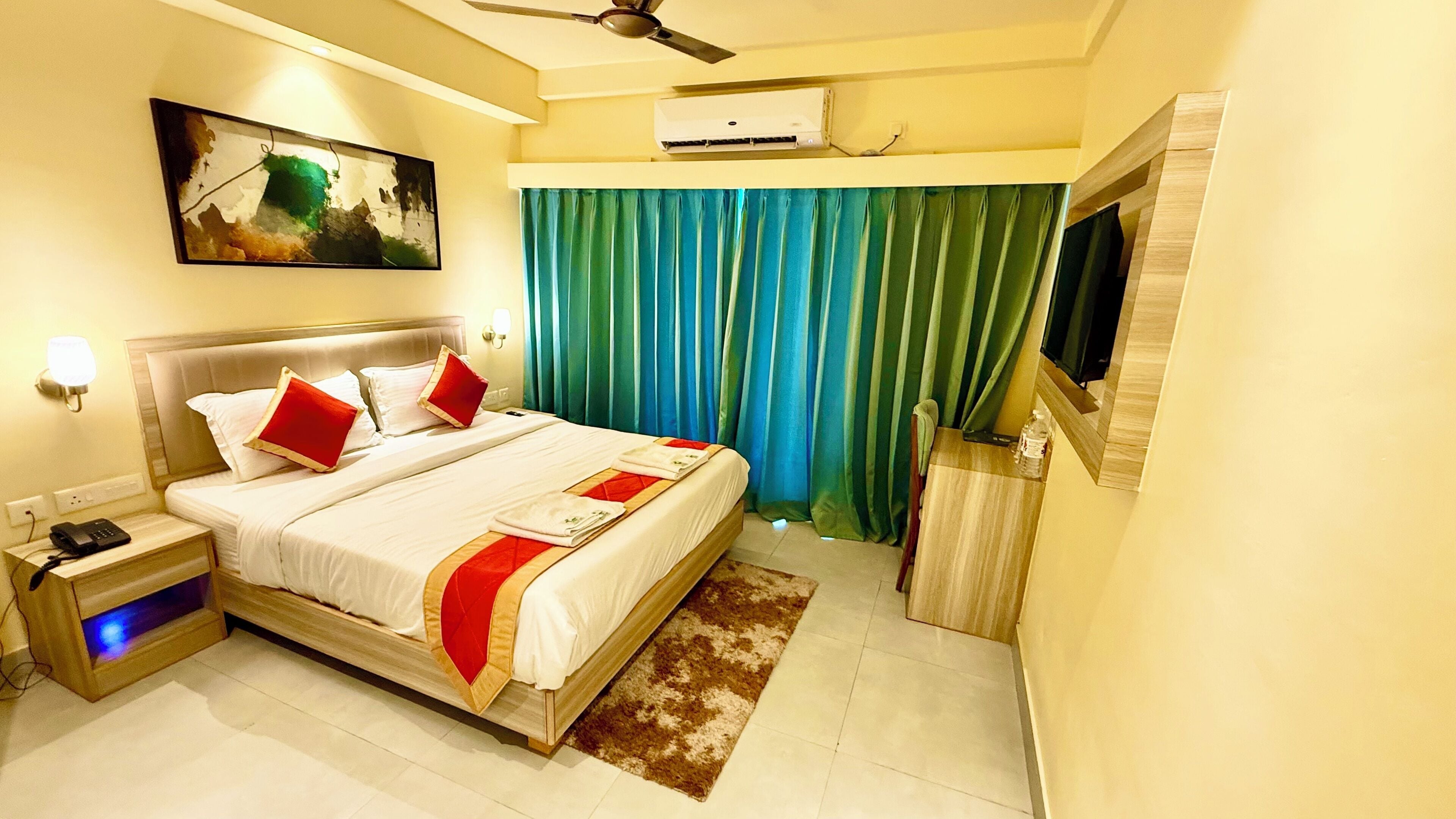 Premium bedding, desk, laptop workspace, soundproofing