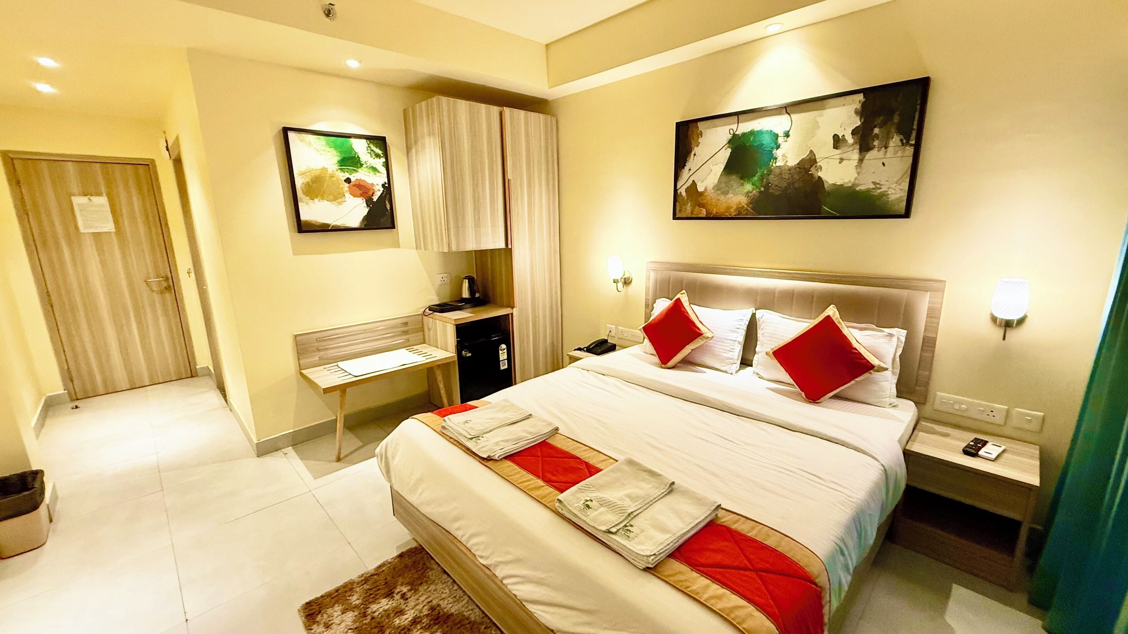 Premium bedding, desk, laptop workspace, soundproofing