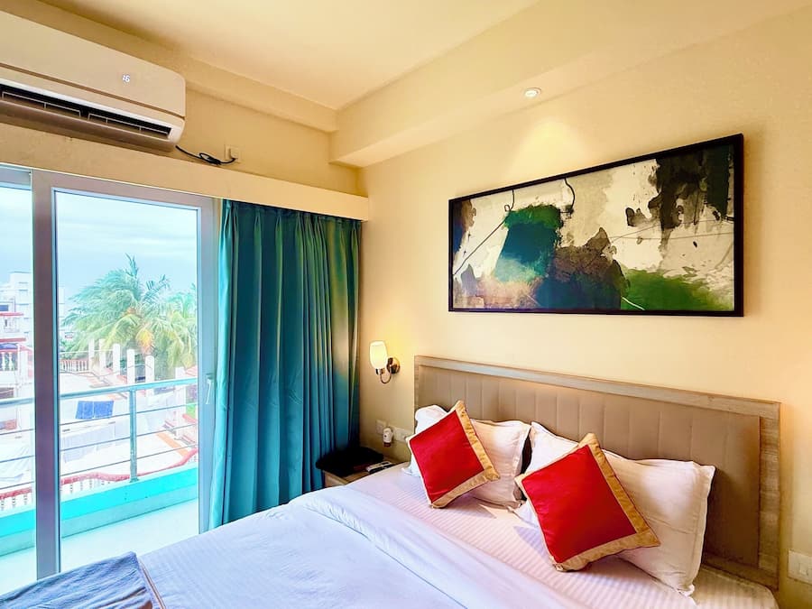 Premium bedding, desk, laptop workspace, soundproofing
