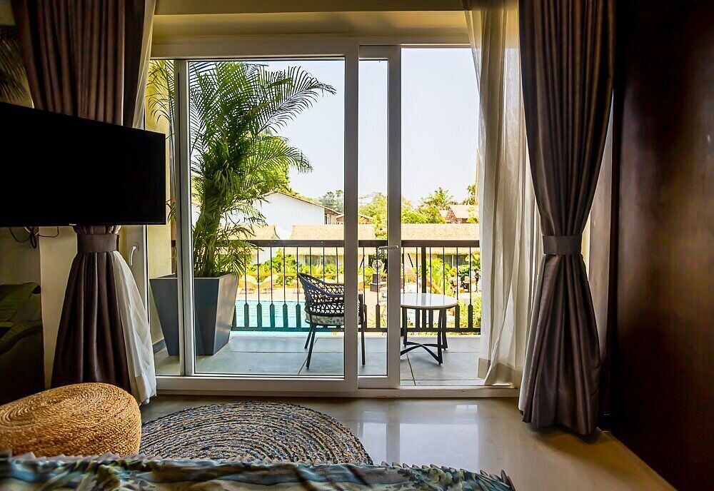 Deluxe Single Room, Balcony, Resort View | In-room safe, desk, laptop workspace, blackout drapes