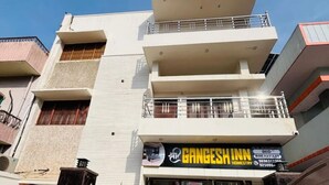 A multi-story building with a restaurant named "Gangesh Inn" on the ground floor. - Shree Gangesh Inn (Varanasi)