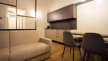 Appartamento Deluxe, 2 camere da letto | Area soggiorno