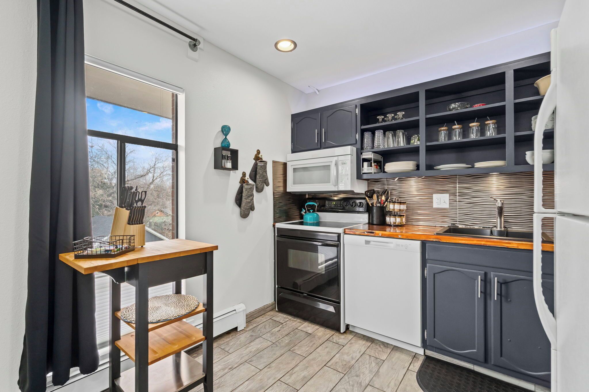 Apartment, Mehrere Betten, Küche, Gartenblick | Eigene Küche | Wasserkocher mit Kaffee-/Teezubehör