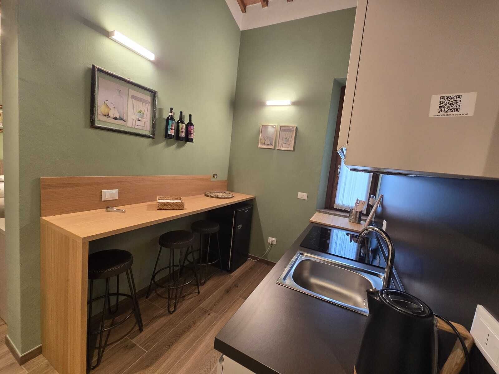 Frigorífico, horno, placa de cocina y cafetera o tetera