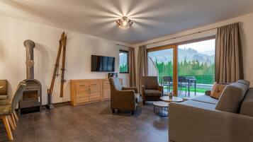 Departamento Confort, balcón, vista al valle | Área de sala de estar