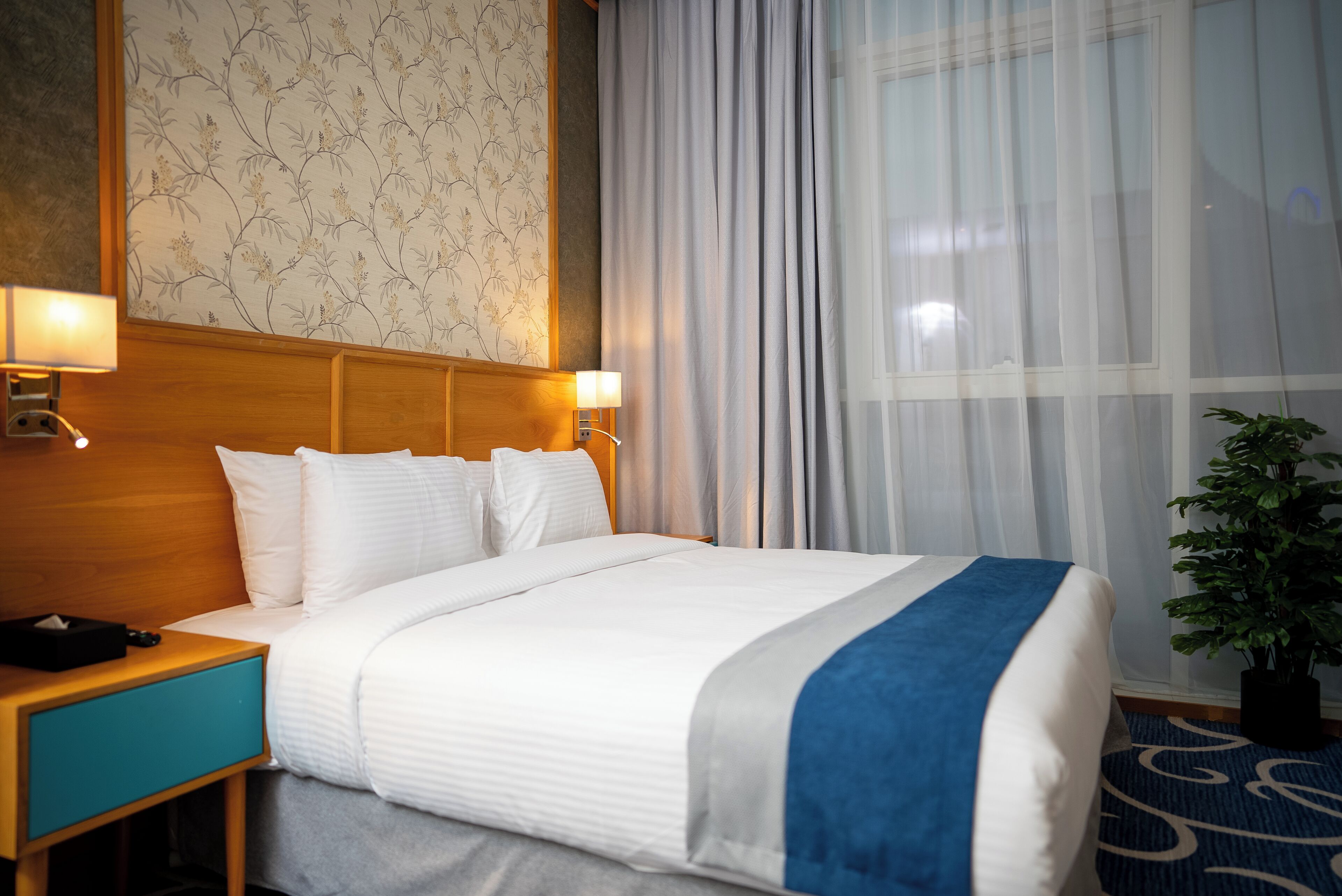 Suite Exécutive | Couette en duvet d'oie, surmatelas, minibar
