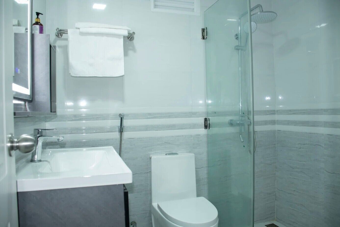 Hair dryer, slippers, towels, soap