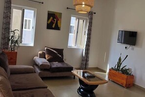 Living area - UrbanSuits Devtraco Court B 2Bedroom With Balcony (Tema)