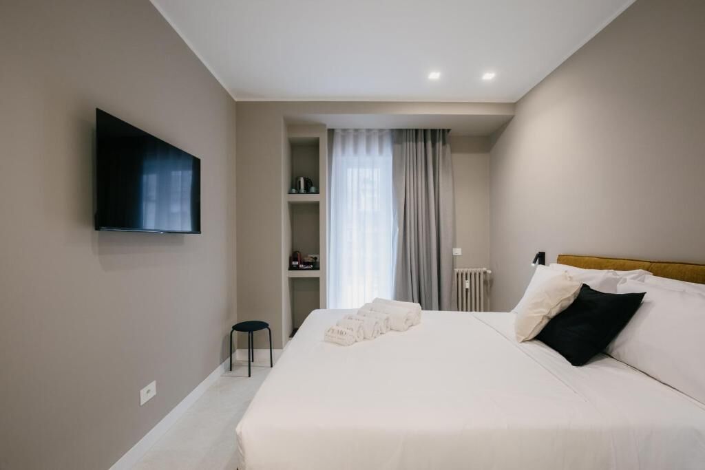 Quarto casal conforto, sacada, vista para o pátio | Wi-Fi de cortesia