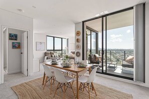 Dining - Waterfront Apartment with Panoramic City Views (Wolli Creek)
